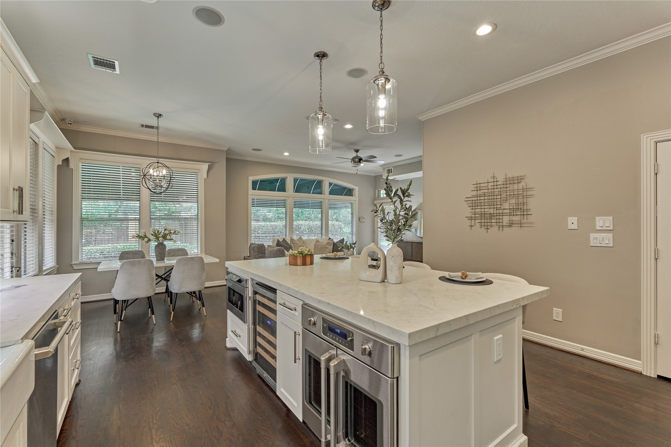 7 Gentry Oak Court Spring, TX 77381 - Photo 21 of 50 a view of a kitchen counter top space with stainless steel appliances granite countertop furniture and a chandelier
