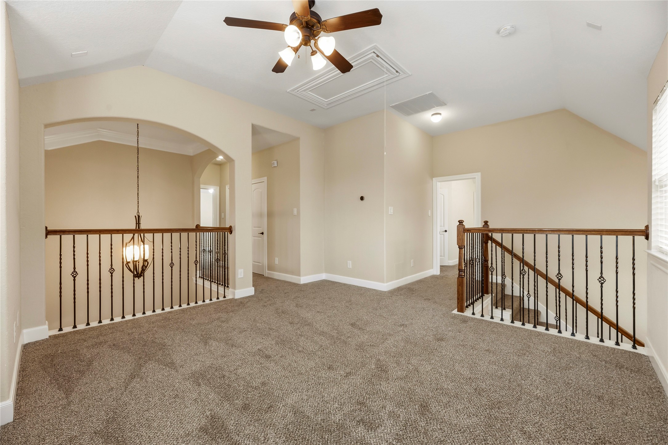 9915 Rochs Hill Court Katy, TX 77494 - Photo 18 of 32 The second-floor loft provides a versatile secondary living area, ideal for a home office or play space central to the upper bedrooms. This space has been virtually staged to showcase its potential.