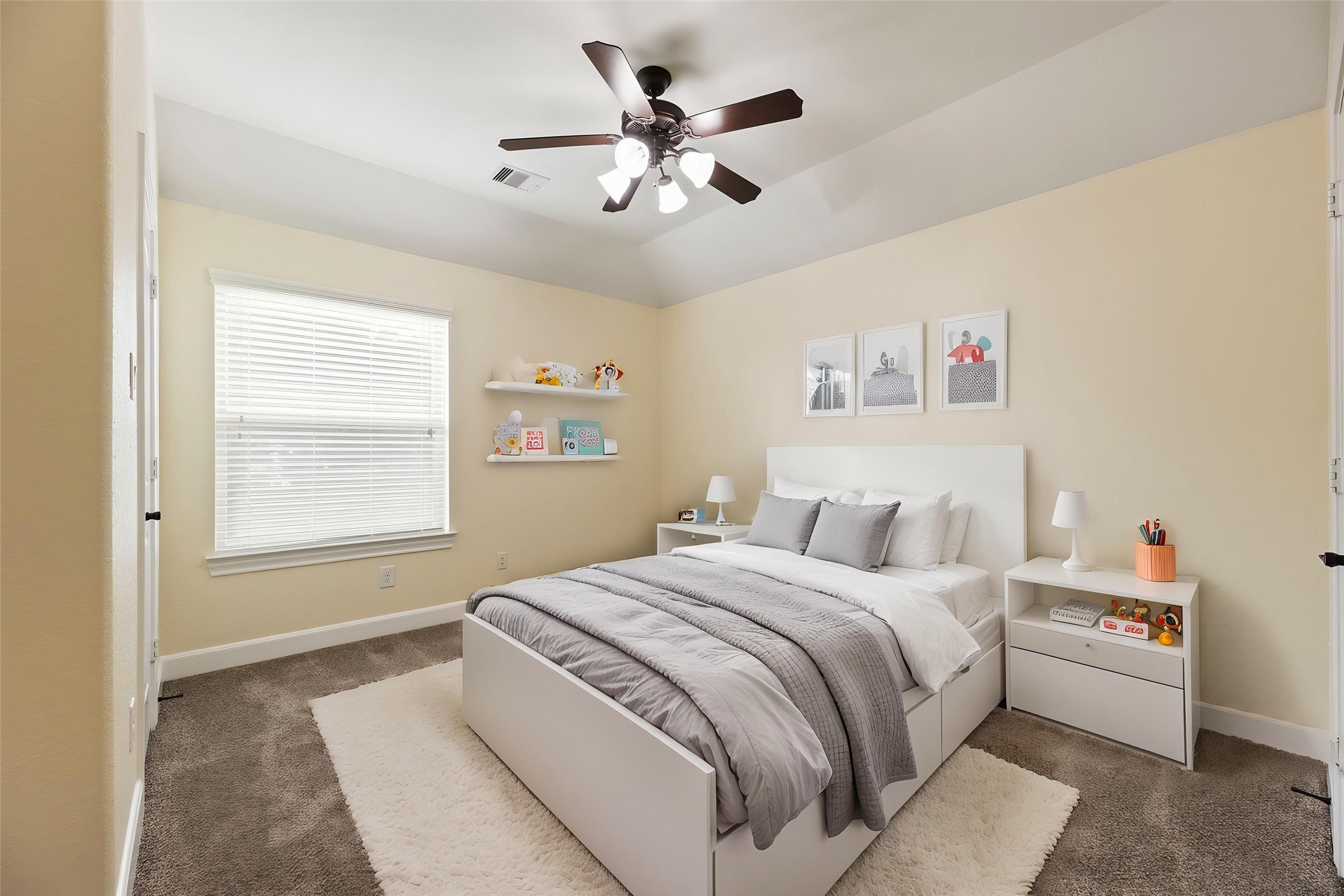 9915 Rochs Hill Court Katy, TX 77494 - Photo 20 of 32 a bedroom with a bed and a chandelier