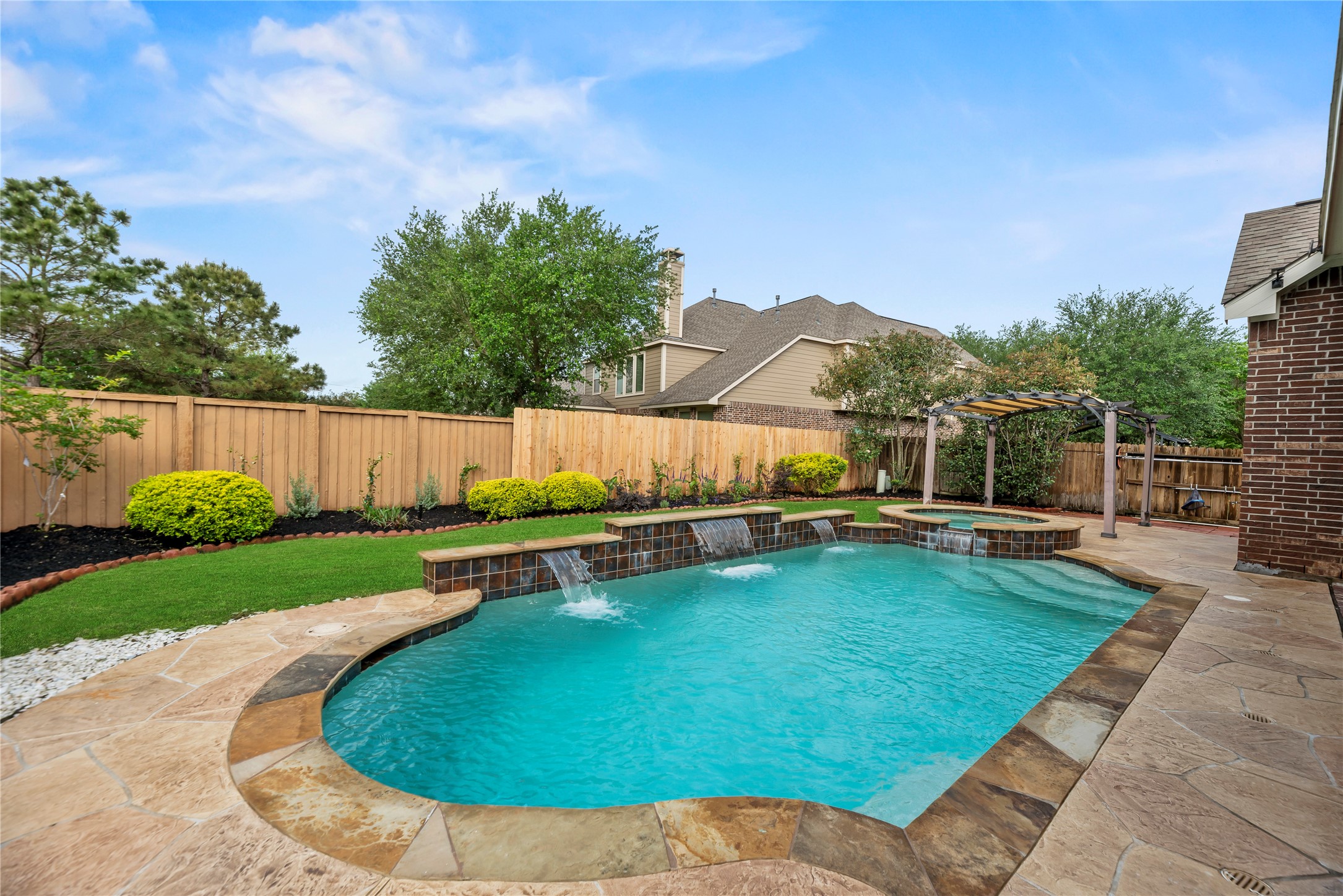9915 Rochs Hill Court Katy, TX 77494 - Photo 2 of 32 a view of swimming pool with lounge chair