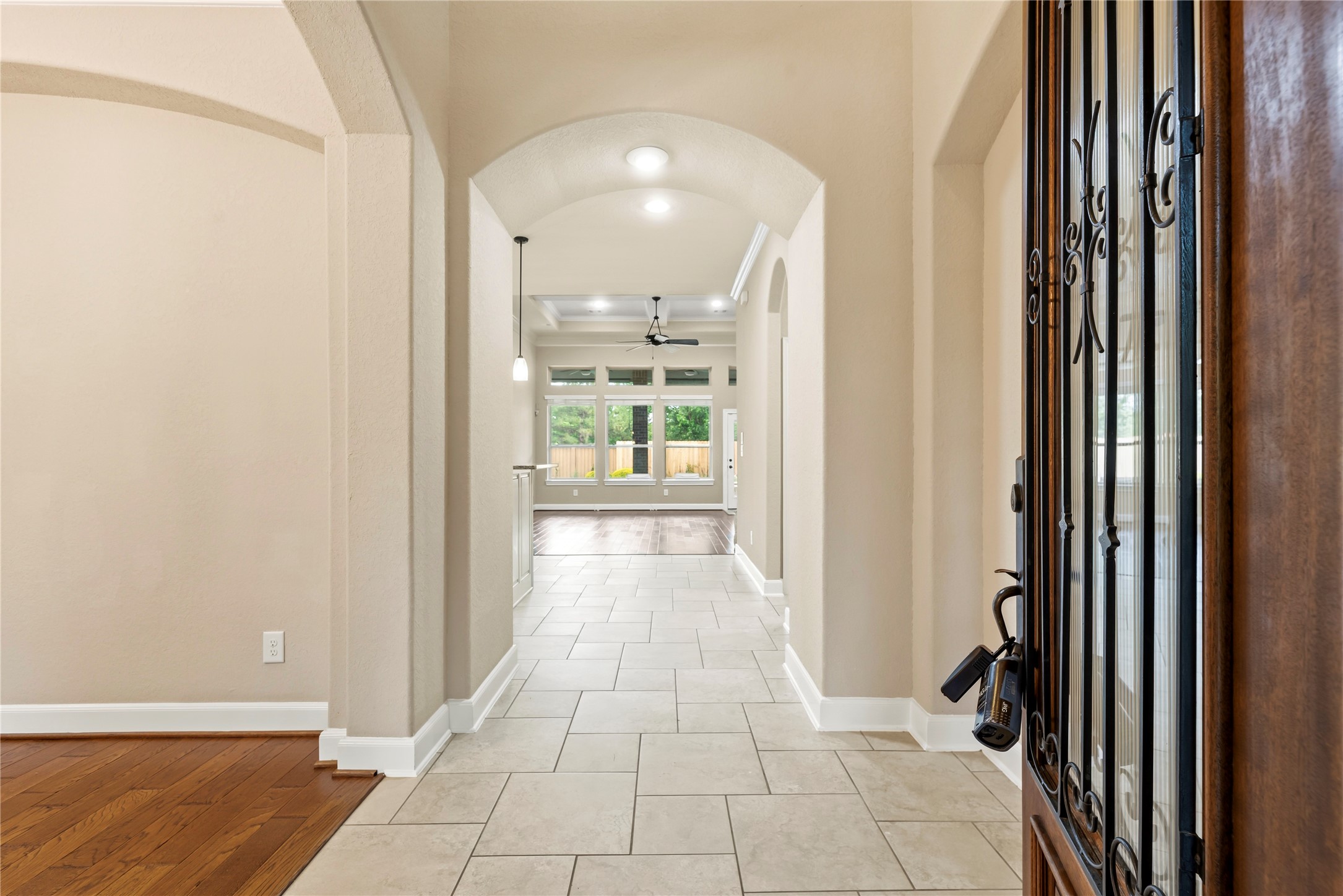 9915 Rochs Hill Court Katy, TX 77494 - Photo 5 of 32 a view of a hallway with a dining room and a livingroom view