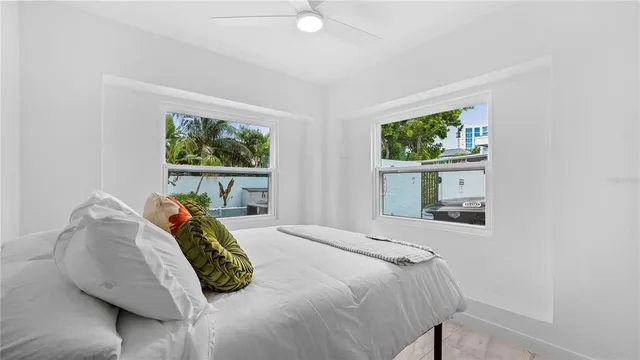 a view of a backyard with a sitting area