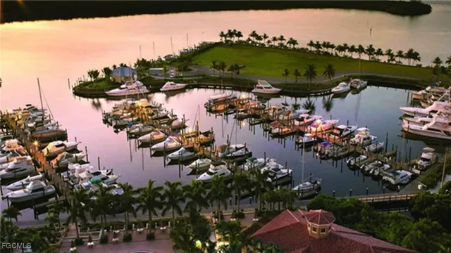 a small pool is sitting in the middle of a lake