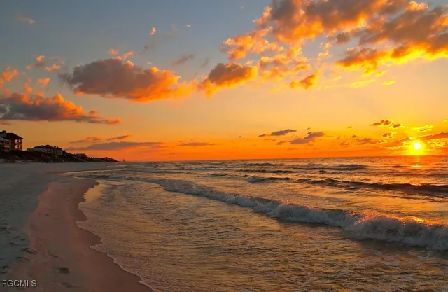 a view of a golf course with a lake