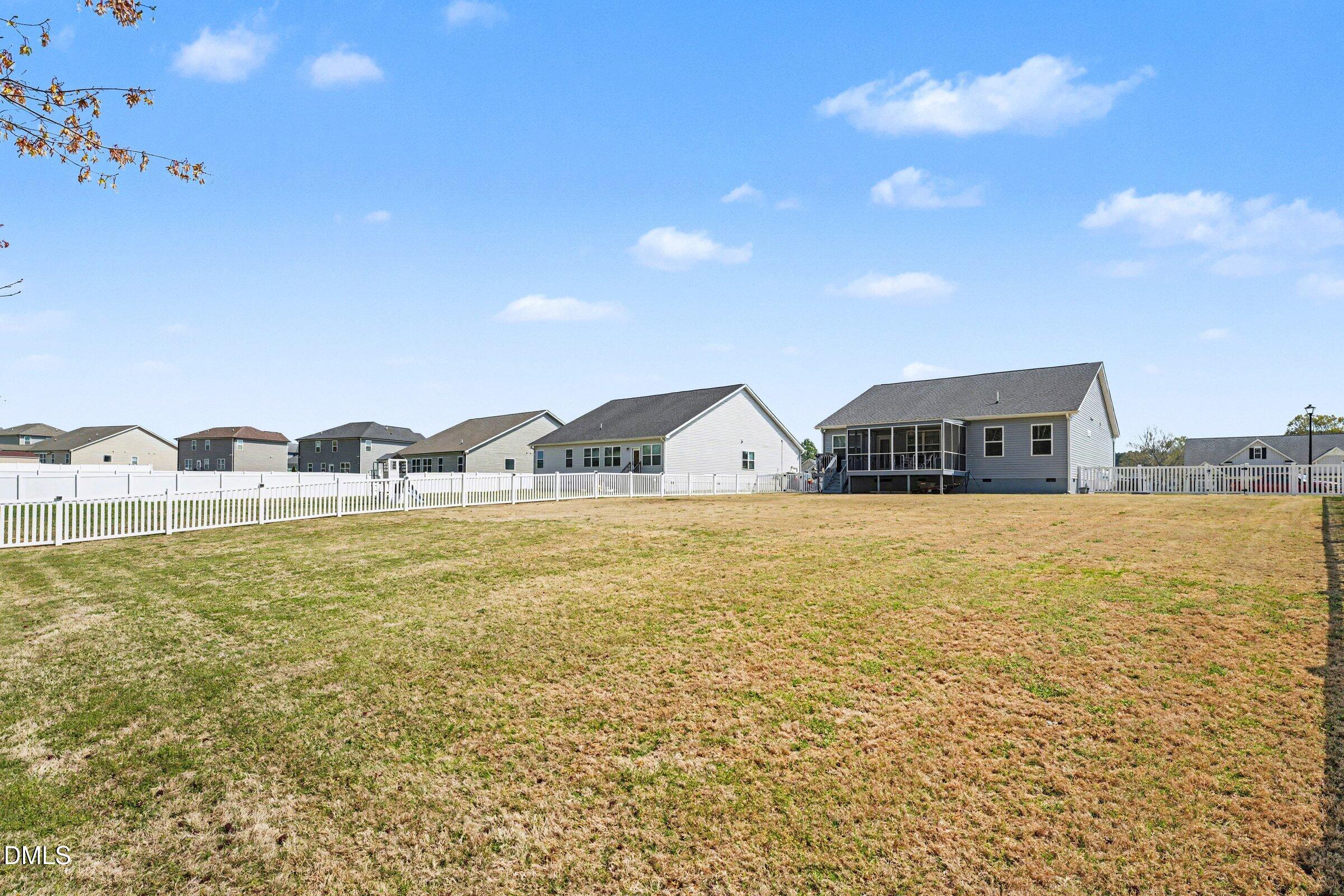 130 Aylebury Ridge Zebulon, NC 27597 - Photo 29 of 41 a front view of house with yard and ocean