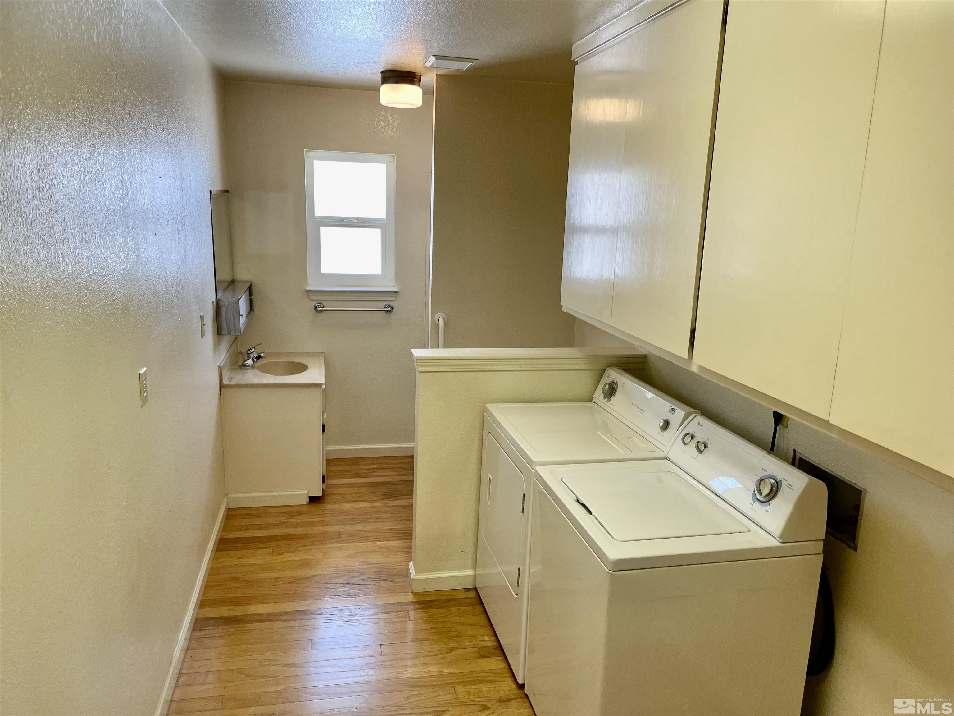 155 Cedar Lane Reno, NV 89521 - Photo 17 of 30 a utility room with dryer and washer