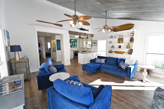 a view of balcony with two chairs and potted plant