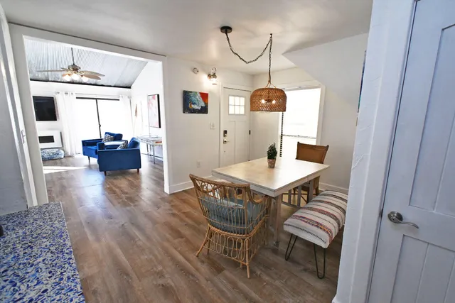 a view of bathroom with a sink and mirror