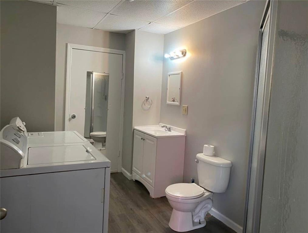 212 5th Street Avonmore, PA 15618 - Photo 5 of 20 a bathroom with a sink toilet and shower