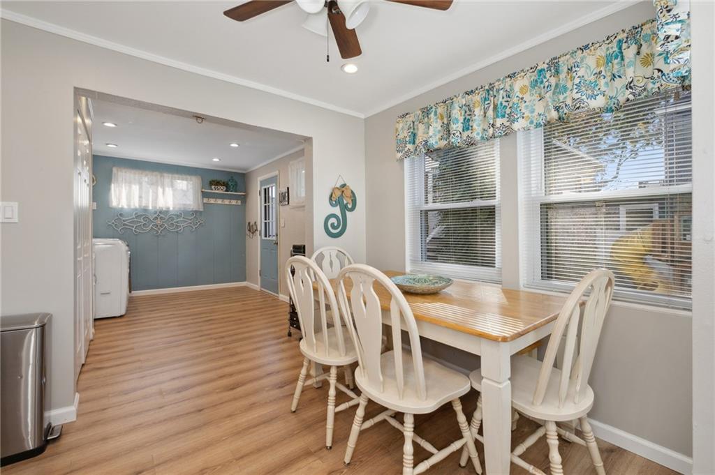 134 Monitor Avenue Pittsburgh, PA 15202 - Photo 12 of 50 a dining room with furniture a chandelier and wooden floor