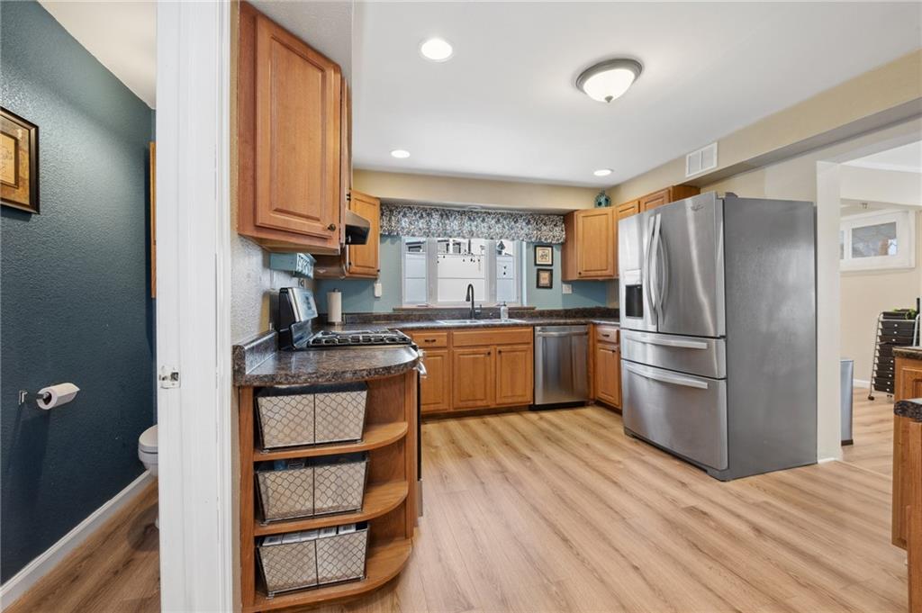 134 Monitor Avenue Pittsburgh, PA 15202 - Photo 14 of 50 a kitchen with stainless steel appliances granite countertop a refrigerator sink and cabinets