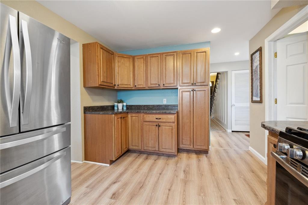 134 Monitor Avenue Pittsburgh, PA 15202 - Photo 16 of 50 a kitchen with stainless steel appliances granite countertop a refrigerator sink and cabinets