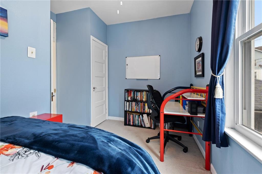 134 Monitor Avenue Pittsburgh, PA 15202 - Photo 20 of 50 a bedroom with a bed and a closet