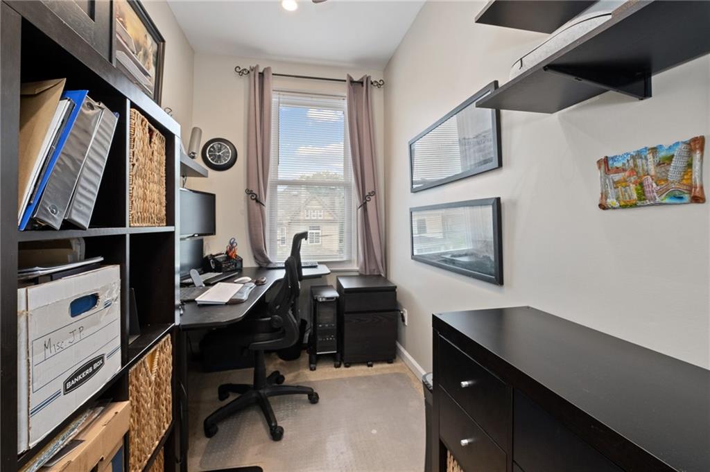 134 Monitor Avenue Pittsburgh, PA 15202 - Photo 26 of 50 a view of a workspace with furniture and a window