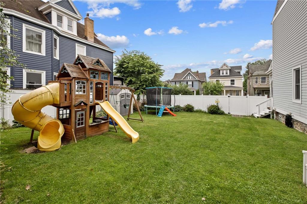 134 Monitor Avenue Pittsburgh, PA 15202 - Photo 3 of 50 a view of a house with a backyard and a patio