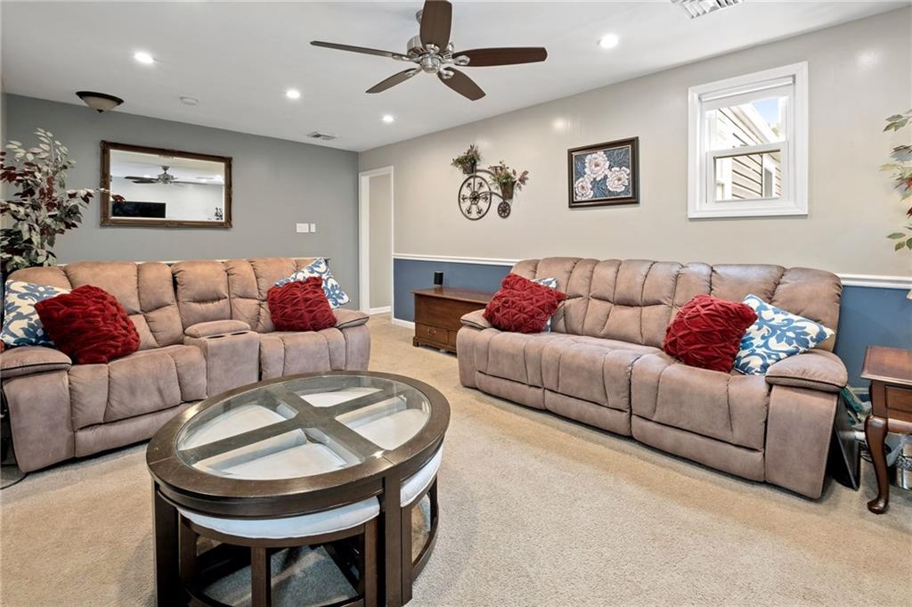 134 Monitor Avenue Pittsburgh, PA 15202 - Photo 32 of 50 a living room with furniture and a large window