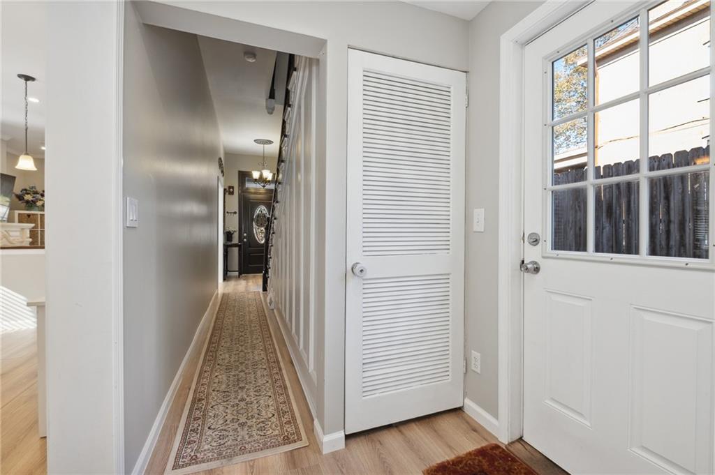 134 Monitor Avenue Pittsburgh, PA 15202 - Photo 36 of 50 a view of a hallway with wooden floor and windows