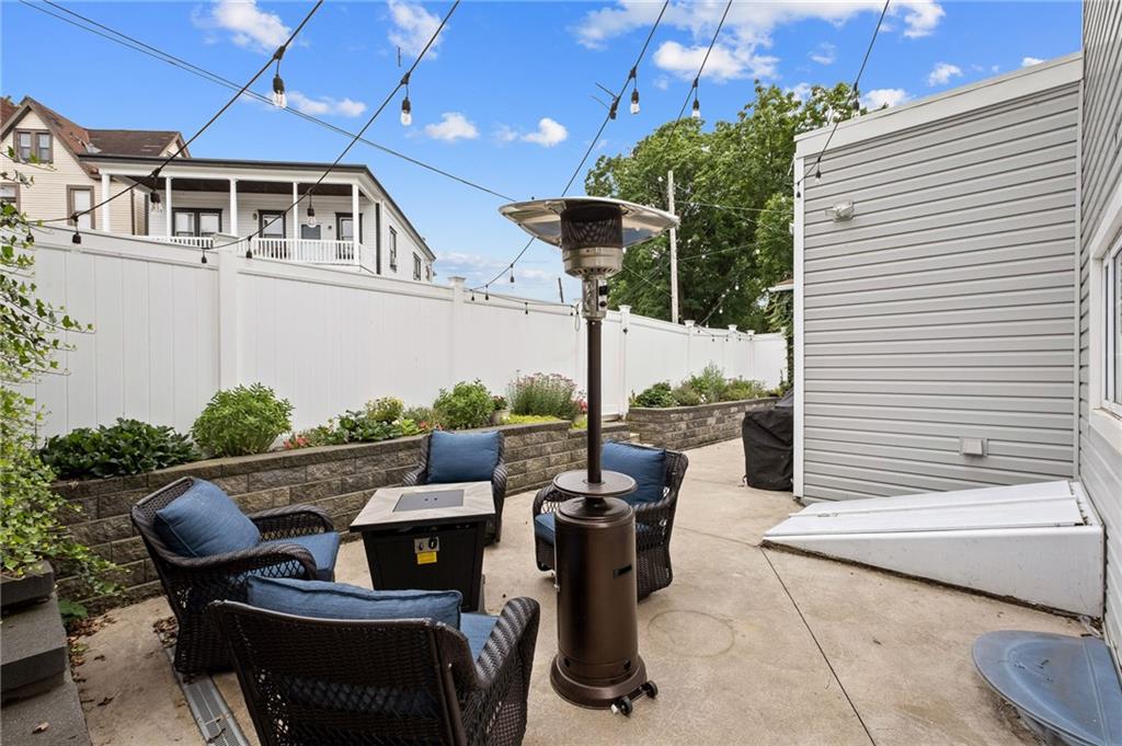 134 Monitor Avenue Pittsburgh, PA 15202 - Photo 42 of 50 a roof deck with table and chairs a barbeque