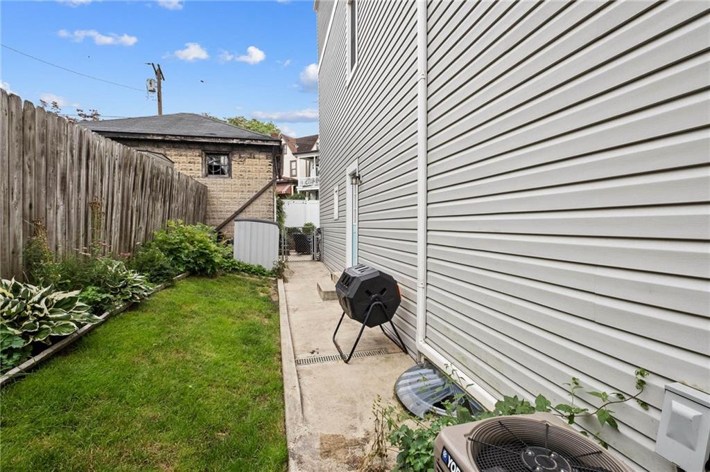 134 Monitor Avenue Pittsburgh, PA 15202 - Photo 43 of 50 a backyard of a house with lots of green space and plants