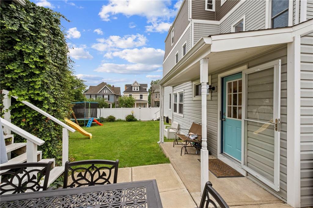 134 Monitor Avenue Pittsburgh, PA 15202 - Photo 45 of 50 a view of a patio with a table and chairs