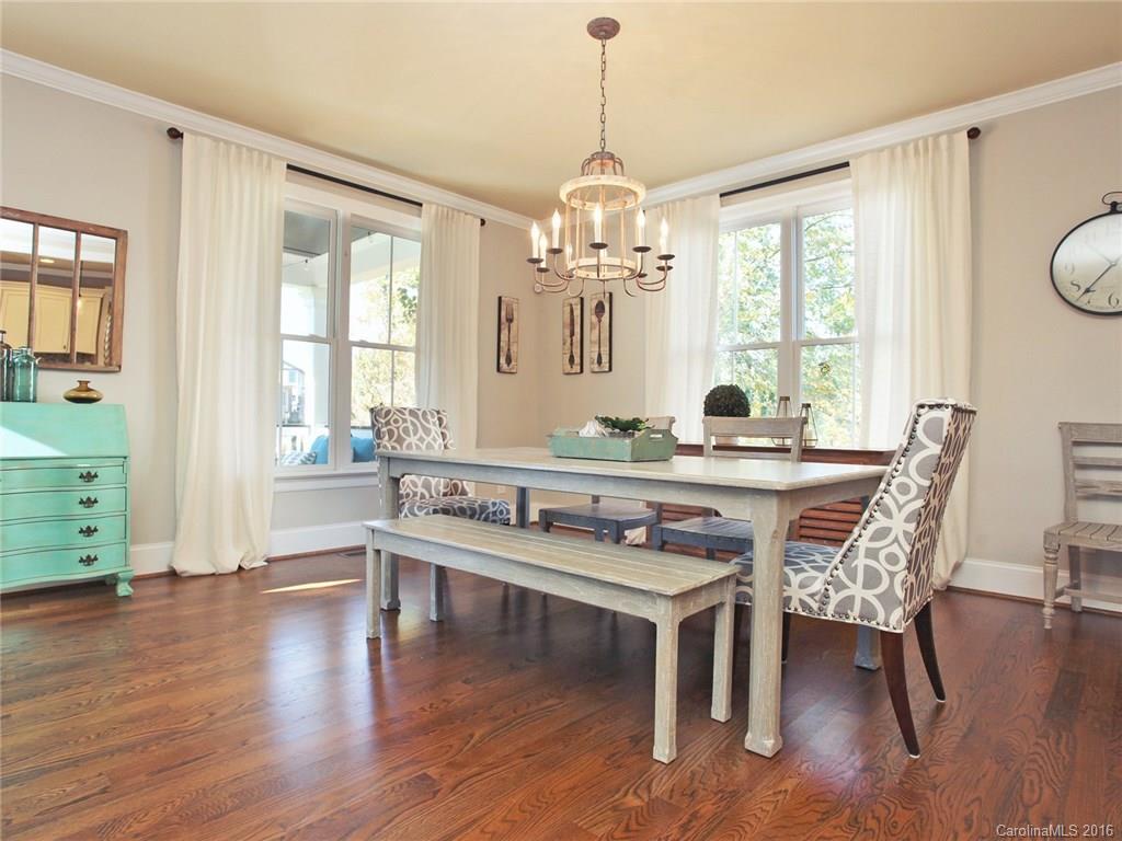 623 Revival Row Fort Mill, SC 29708 - Photo 15 of 24 a view of a dining room with furniture window and wooden floor