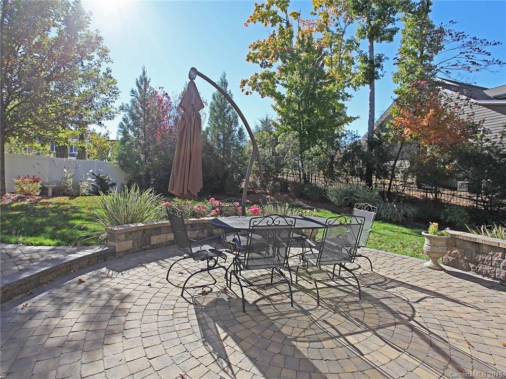 623 Revival Row Fort Mill, SC 29708 - Photo 3 of 24 a view of a table and chairs in the garden