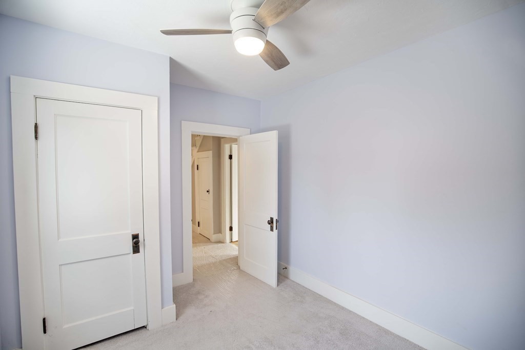 50 Newfields Road, Unit D Exeter, NH 03833 - Photo 27 of 36 a view of a hallway with closet
