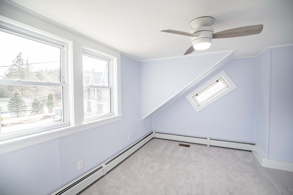 50 Newfields Road, Unit D Exeter, NH 03833 - Photo 28 of 36 a view of an empty room with a window