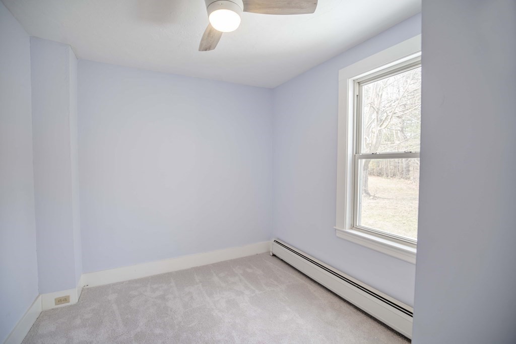 50 Newfields Road, Unit D Exeter, NH 03833 - Photo 32 of 36 an empty room with a window