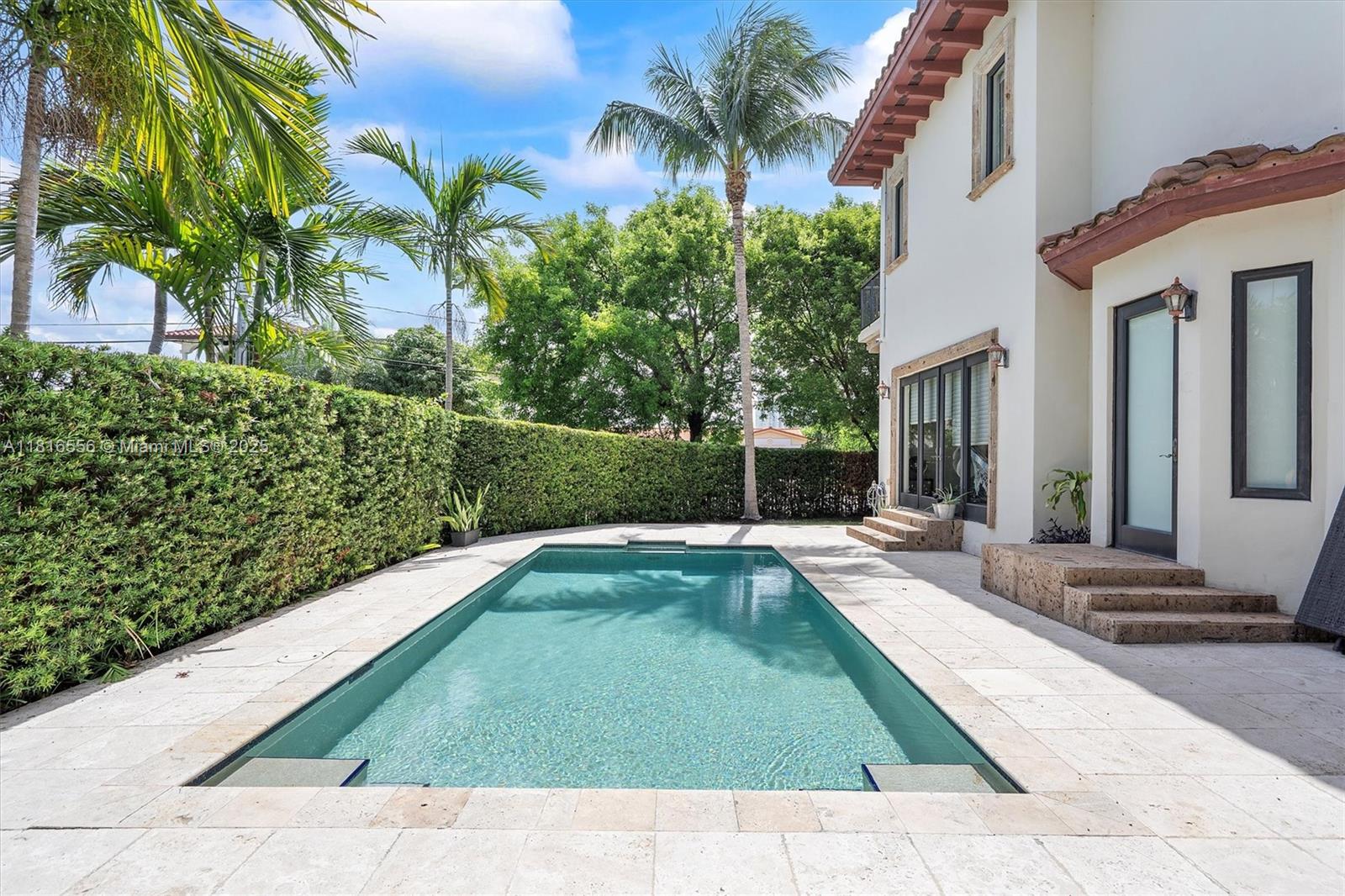 18825 North Bay Road Sunny Isles Beach, FL 33160 - Photo 12 of 62 a view of swimming pool with patio