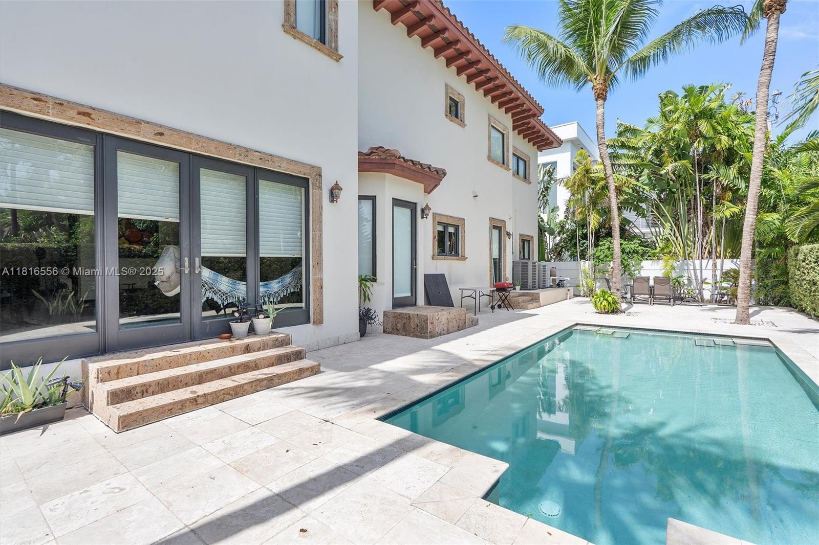 18825 North Bay Road Sunny Isles Beach, FL 33160 - Photo 13 of 62 a view of a house with backyard and sitting area