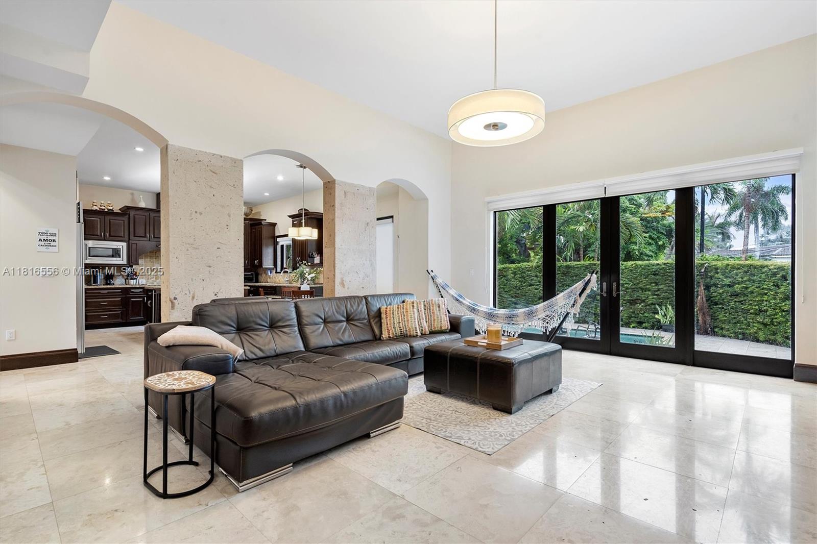 18825 North Bay Road Sunny Isles Beach, FL 33160 - Photo 19 of 62 a living room with furniture and a large window