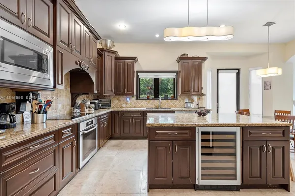 a bathroom with a sink toilet and mirror