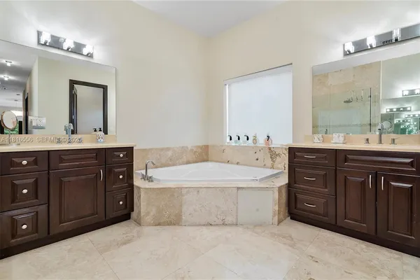 a kitchen with a sink stove and refrigerator