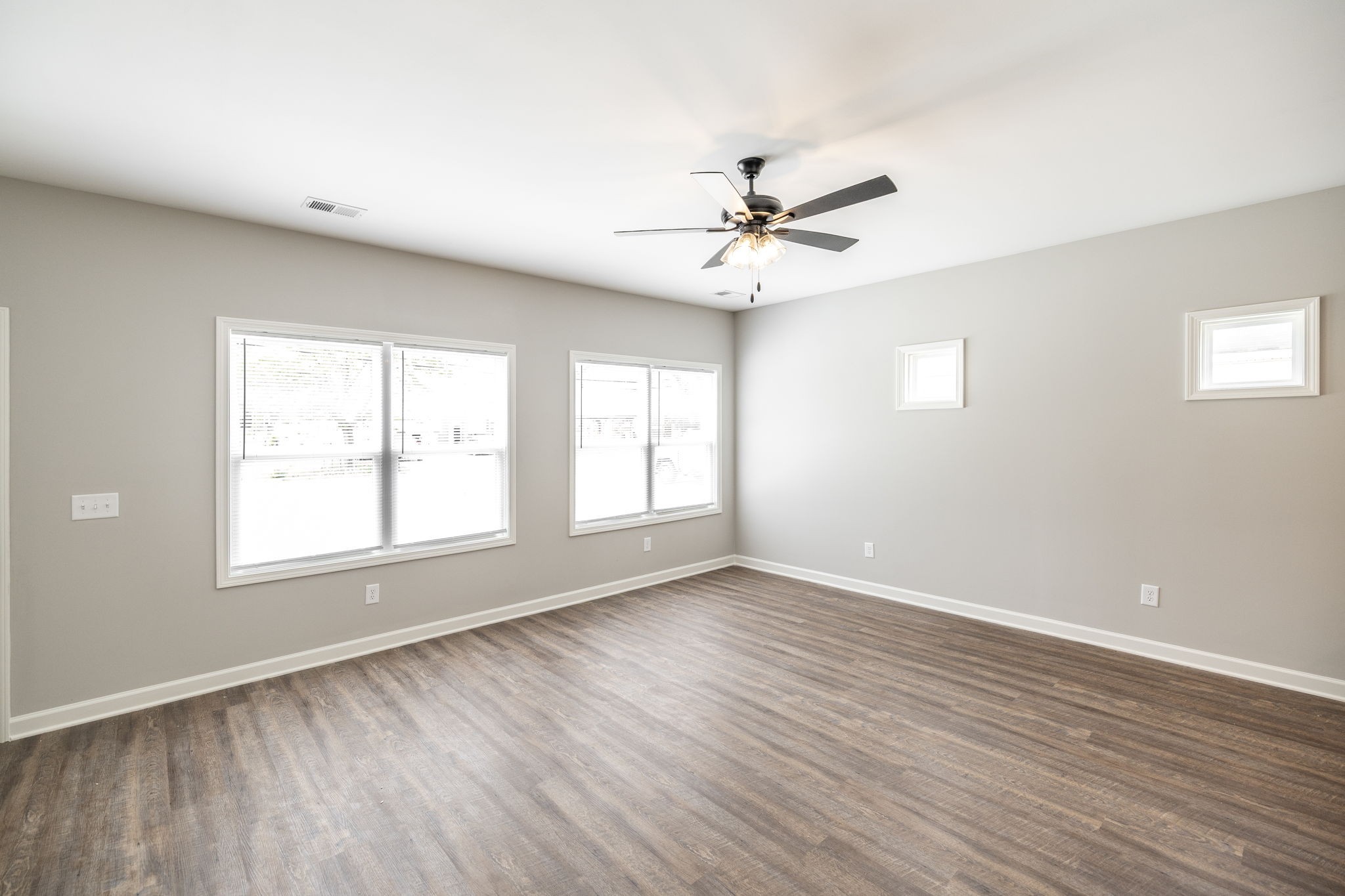 103 Portland Boulevard Portland, TN 37148 - Photo 29 of 100 a view of an empty room with wooden floor and a window
