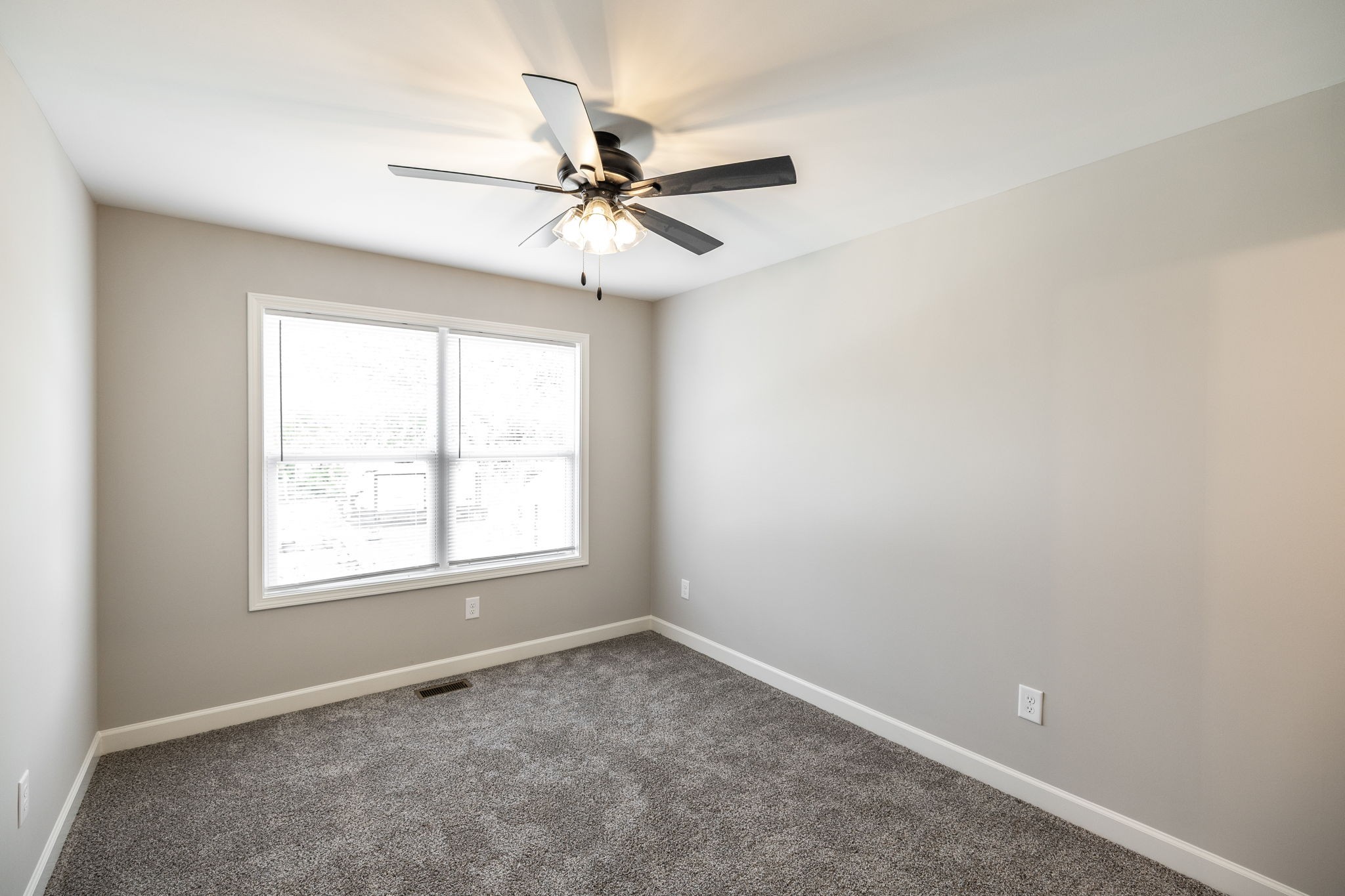 103 Portland Boulevard Portland, TN 37148 - Photo 61 of 100 an empty room with a window and a fan
