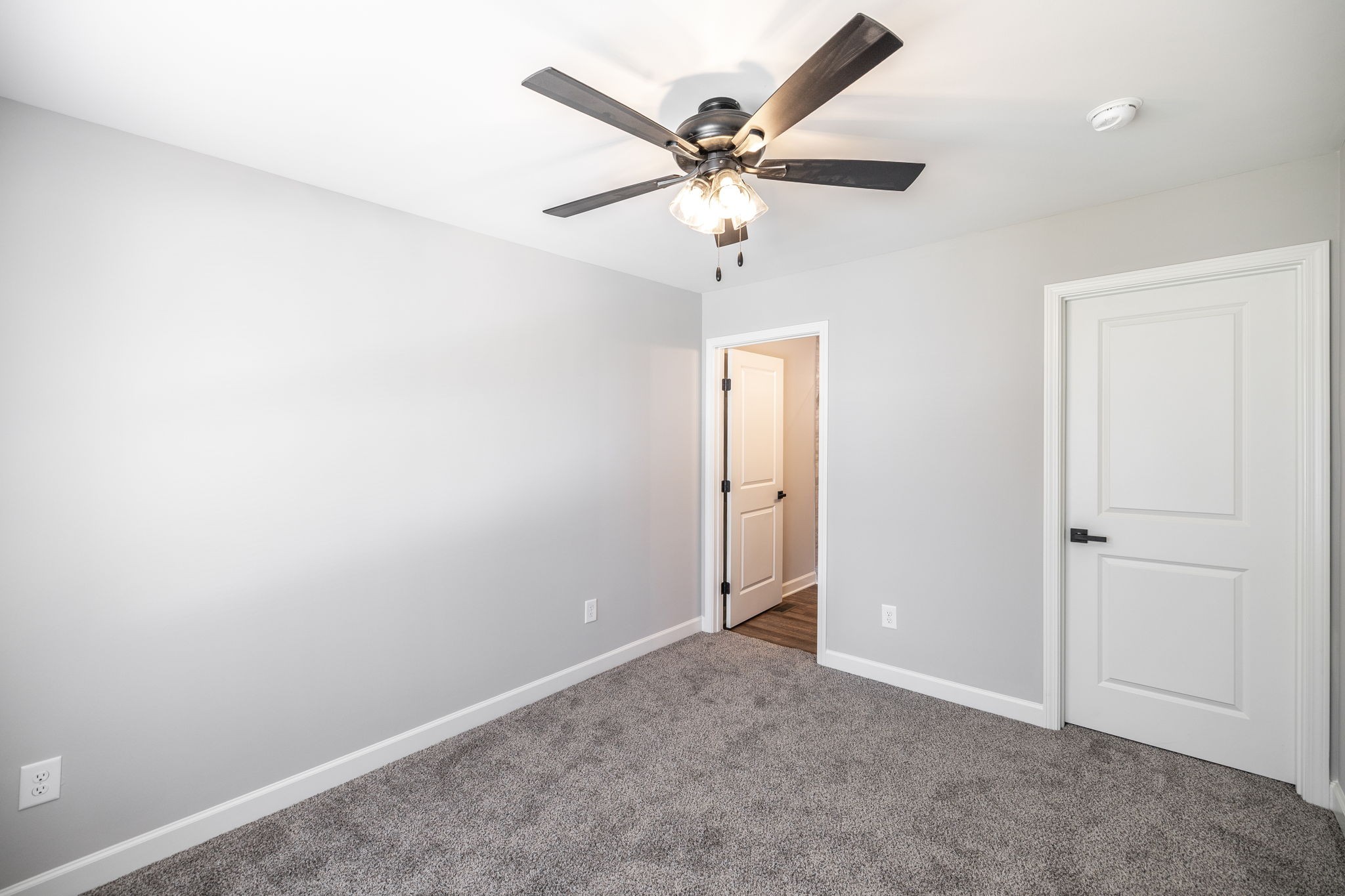 103 Portland Boulevard Portland, TN 37148 - Photo 62 of 100 an empty room with a ceiling fan and a window