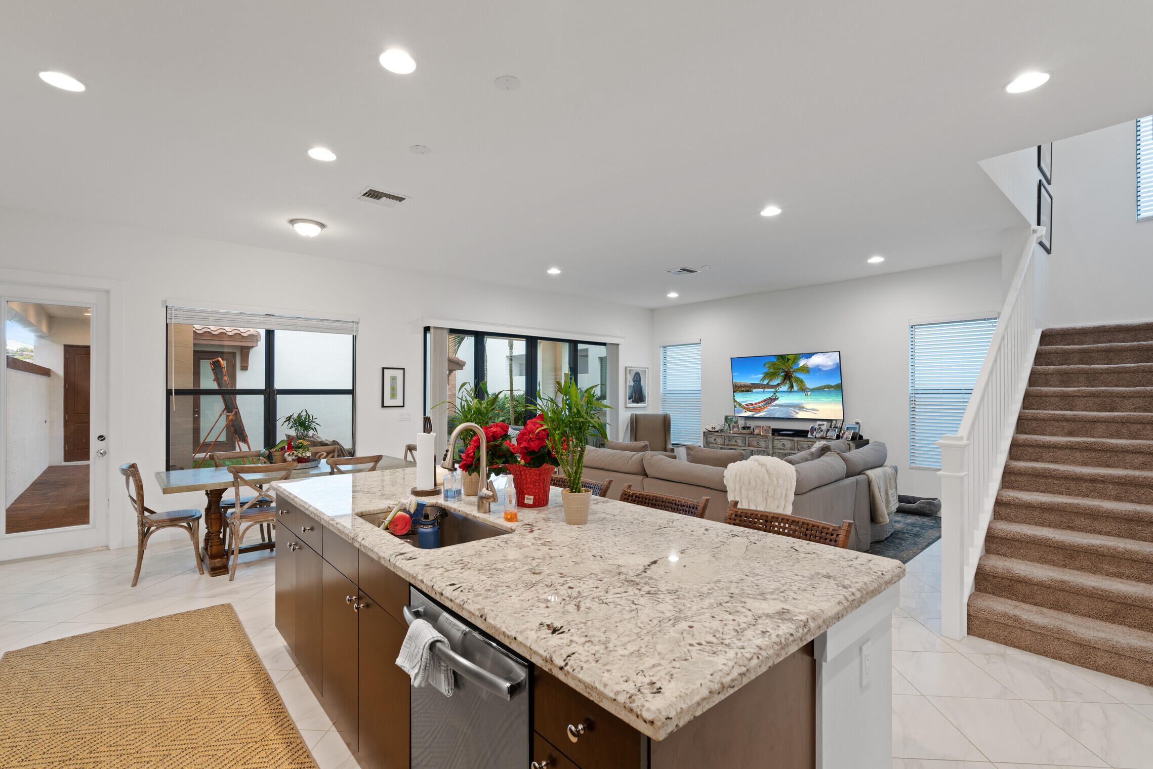 4084 Faraday Way Palm Beach Gardens, FL 33418 - Photo 11 of 43 a view of a living room and dining room