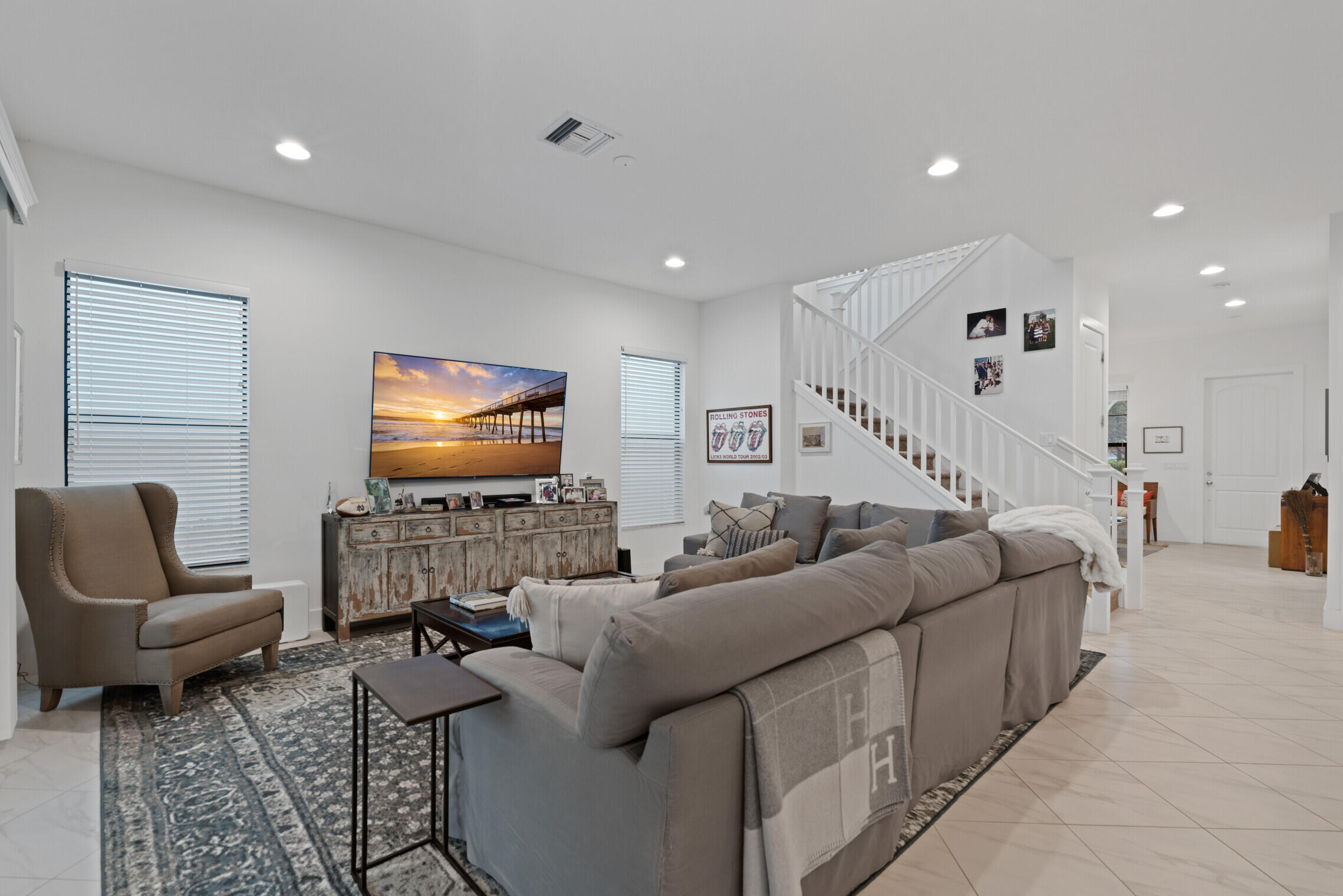 4084 Faraday Way Palm Beach Gardens, FL 33418 - Photo 13 of 43 a living room with furniture and a flat screen tv