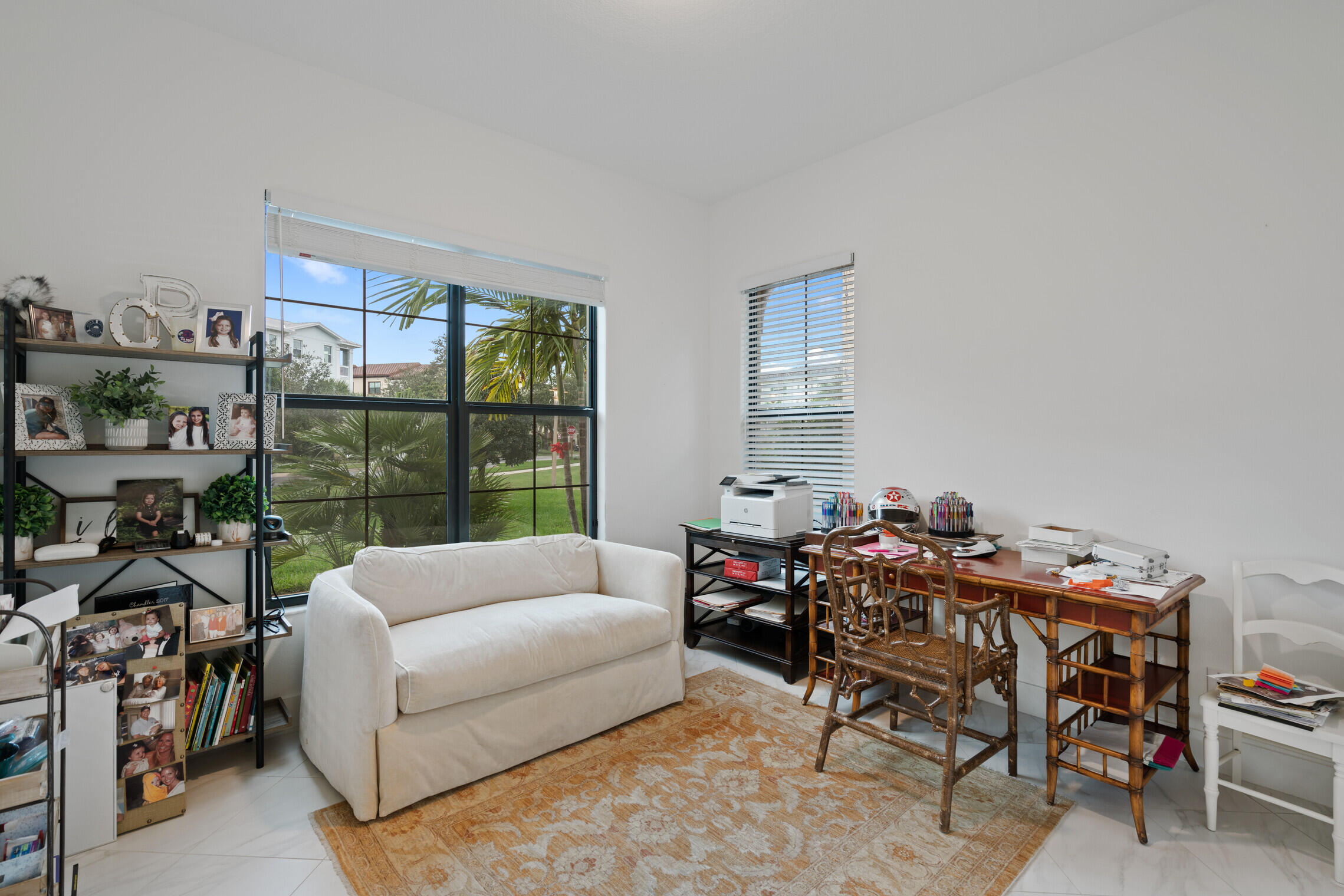 4084 Faraday Way Palm Beach Gardens, FL 33418 - Photo 17 of 43 a living room with furniture and a window
