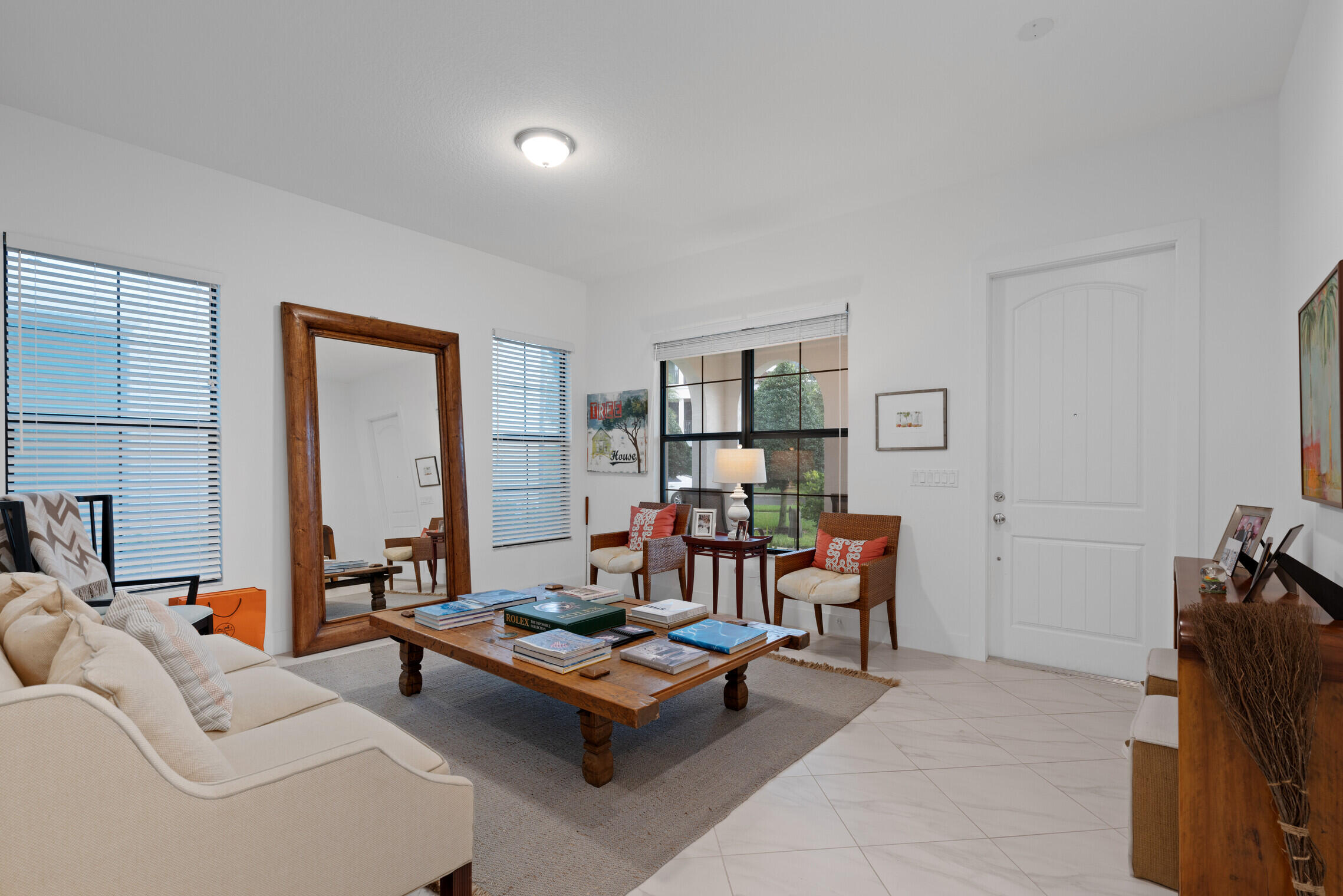 4084 Faraday Way Palm Beach Gardens, FL 33418 - Photo 9 of 43 a living room with furniture and a flat screen tv