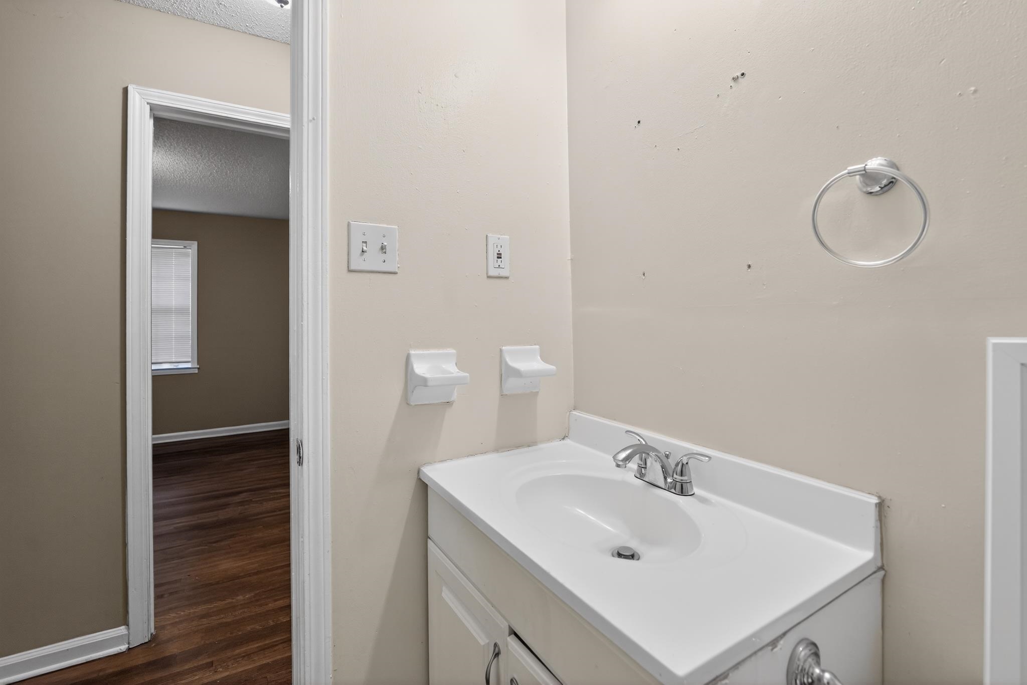 2015 East Holmes Road Memphis, TN 38116 - Photo 32 of 34 a bathroom with a sink a toilet and shower