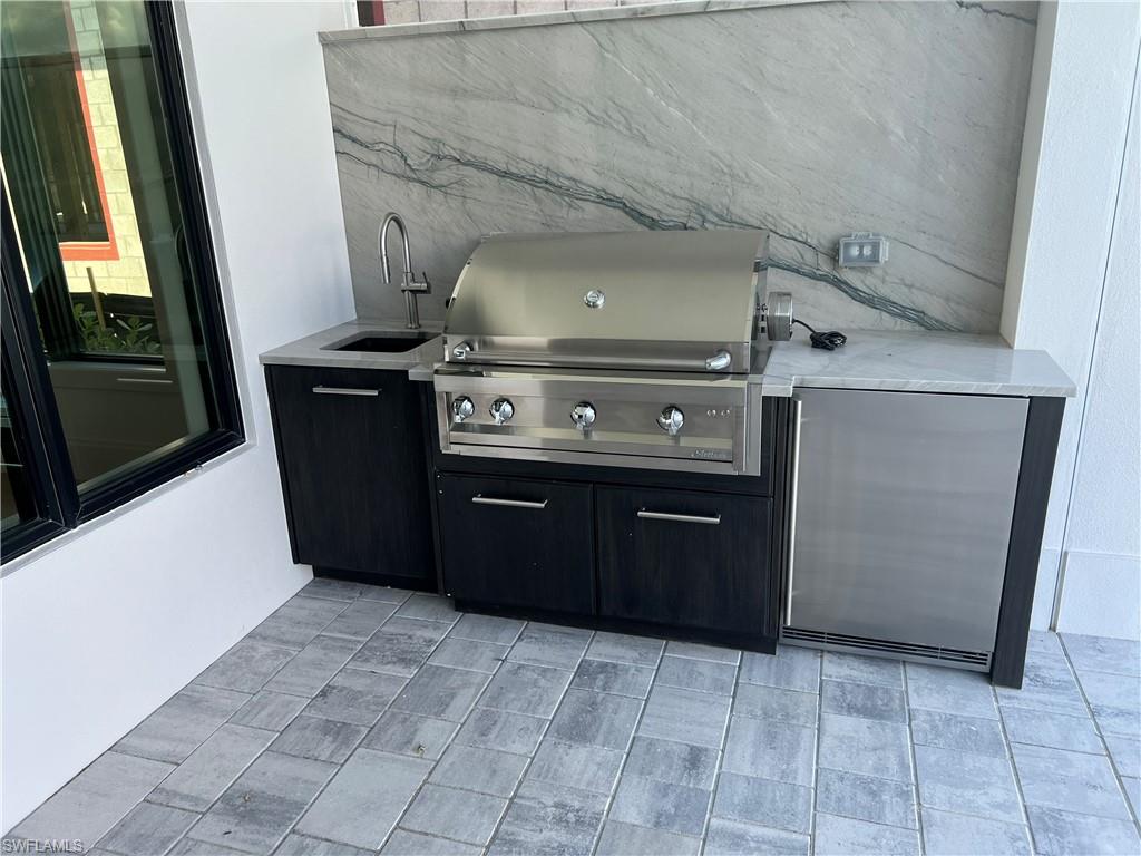 6708 Newport Road Naples, FL 34109 - Photo 9 of 48 Outdoor Kitchen
