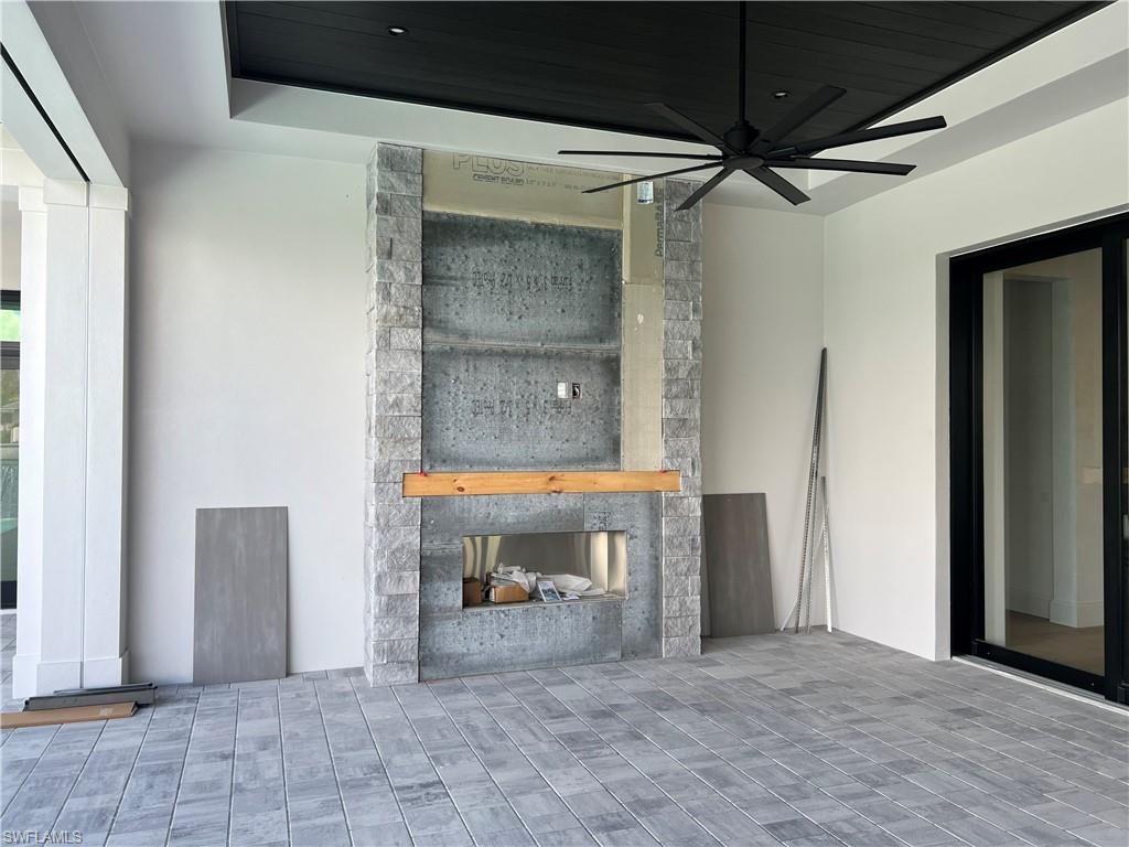 6708 Newport Road Naples, FL 34109 - Photo 10 of 48 Outdoor Fireplace