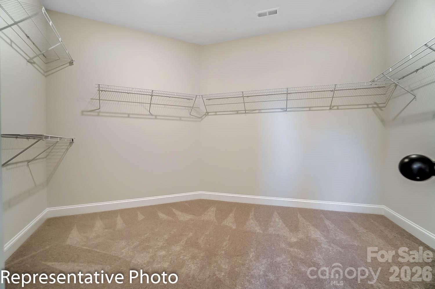 2038 Mantle Rdg Drive Indian Trail, NC 28079 - Photo 14 of 15 a view of a room with racks on the wall