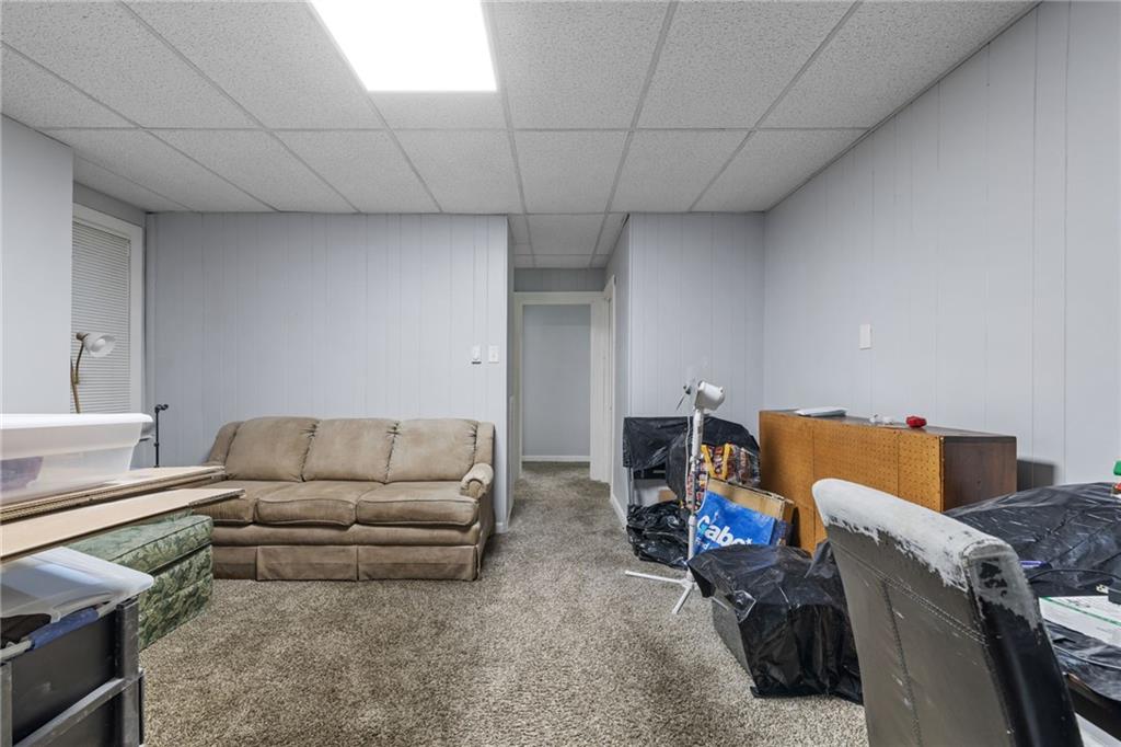 2923-2925 Brownsville Road Pittsburgh, PA 15227 - Photo 19 of 38 a living room with furniture and a couch