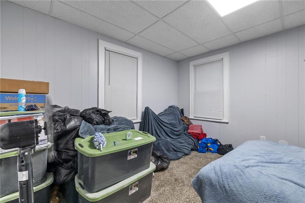 2923-2925 Brownsville Road Pittsburgh, PA 15227 - Photo 21 of 38 a living room with furniture and a flat screen tv