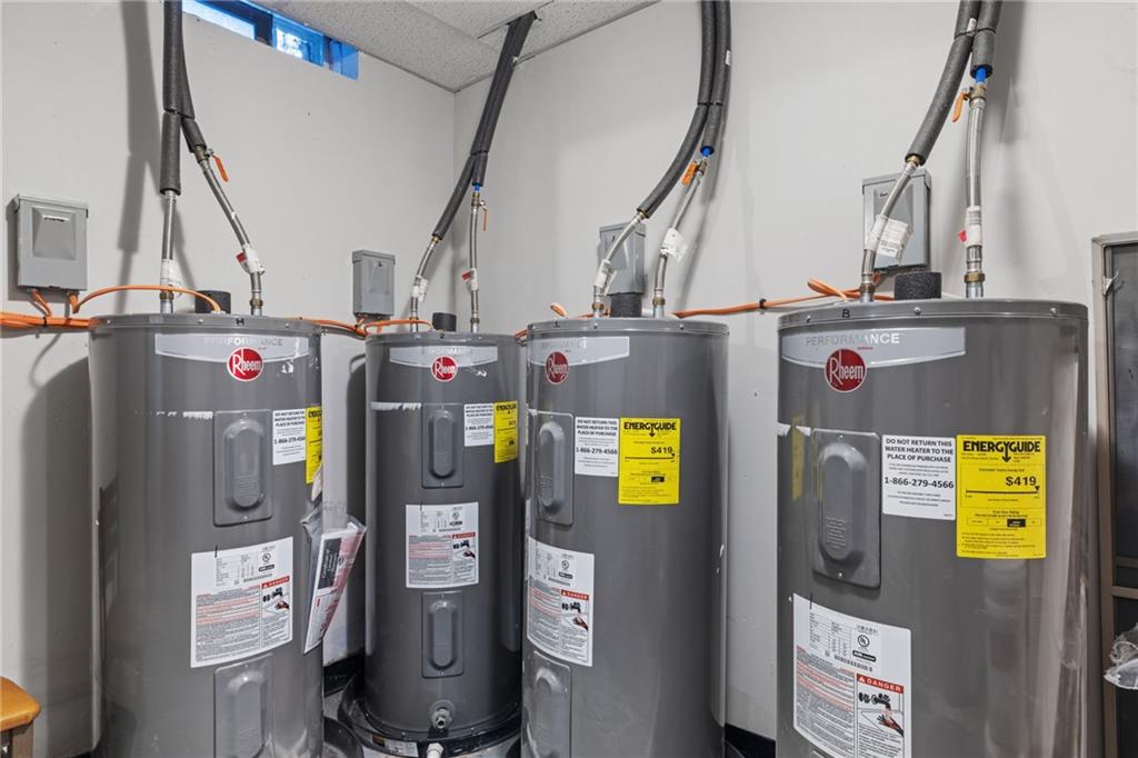 2923-2925 Brownsville Road Pittsburgh, PA 15227 - Photo 32 of 38 a utility room with stainless steel appliances and refrigerator