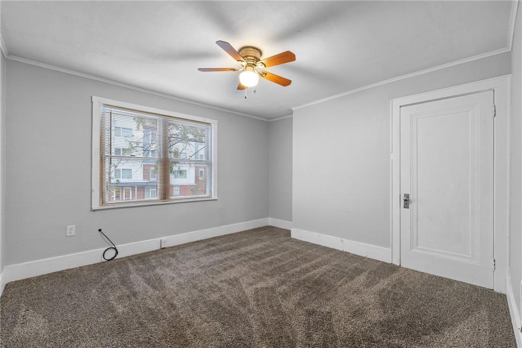 2923-2925 Brownsville Road Pittsburgh, PA 15227 - Photo 5 of 38 a view of an empty room with a window