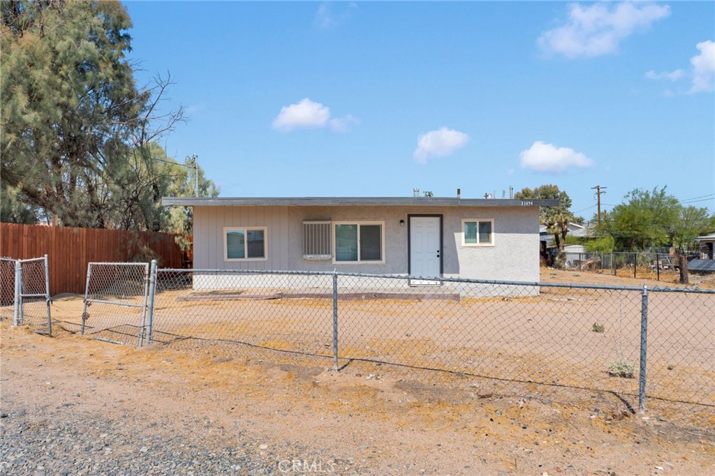 33454 Hampton Way Daggett, CA 92327 - Photo 1 of 17 a view of a house with backyard